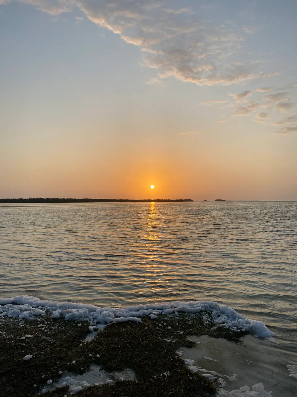 Zonsopkomst boven het water bij Holbox